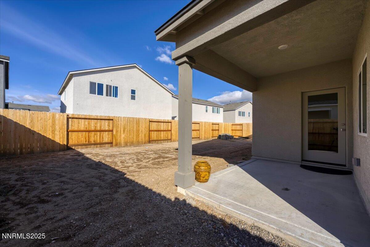 7523 Grassy Plains Drive Reno, NV 89506 - Photo 20 of 22 a view of a house with backyard
