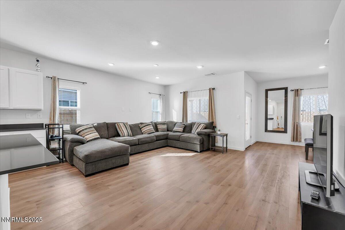 7523 Grassy Plains Drive Reno, NV 89506 - Photo 6 of 22 a living room with furniture window and a table