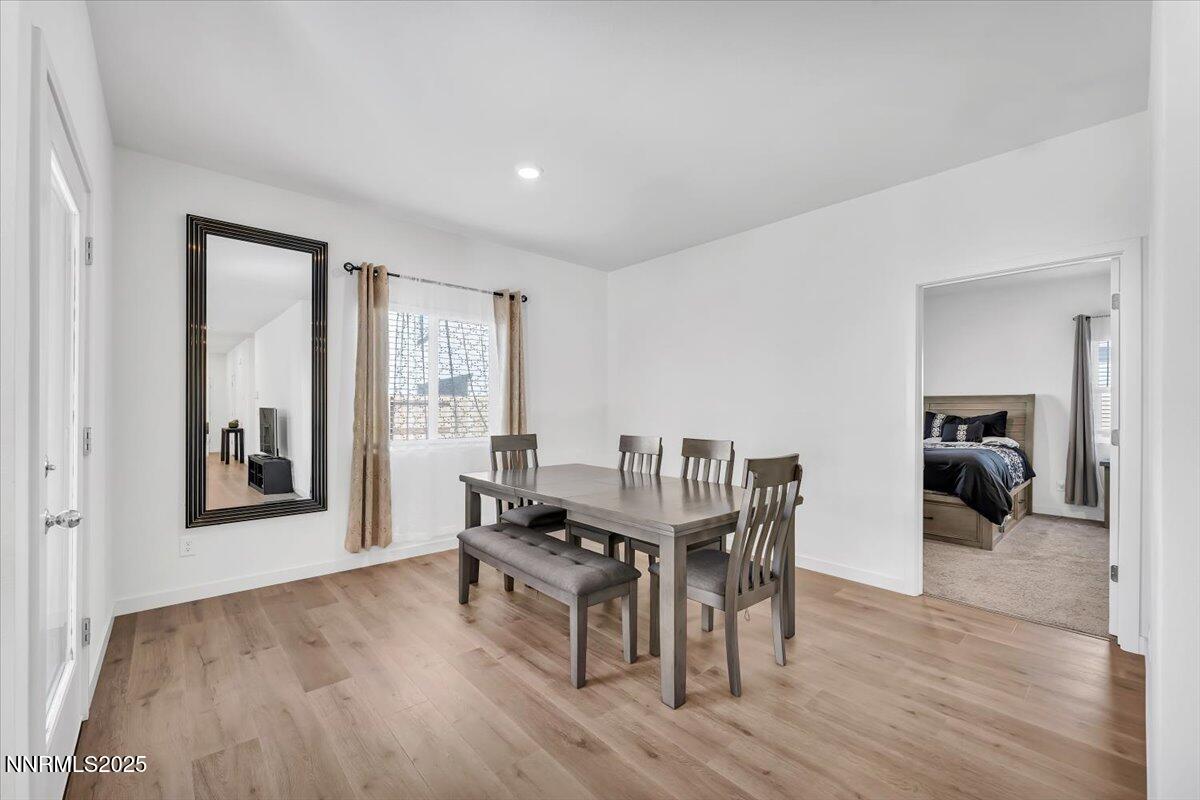7523 Grassy Plains Drive Reno, NV 89506 - Photo 10 of 22 a living room with furniture and a wooden floor