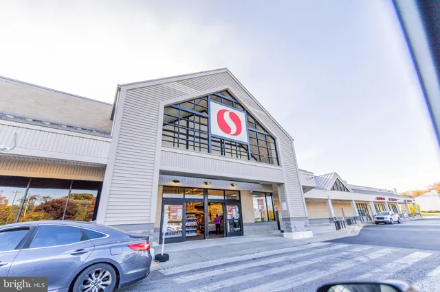 a car parked in front of a building