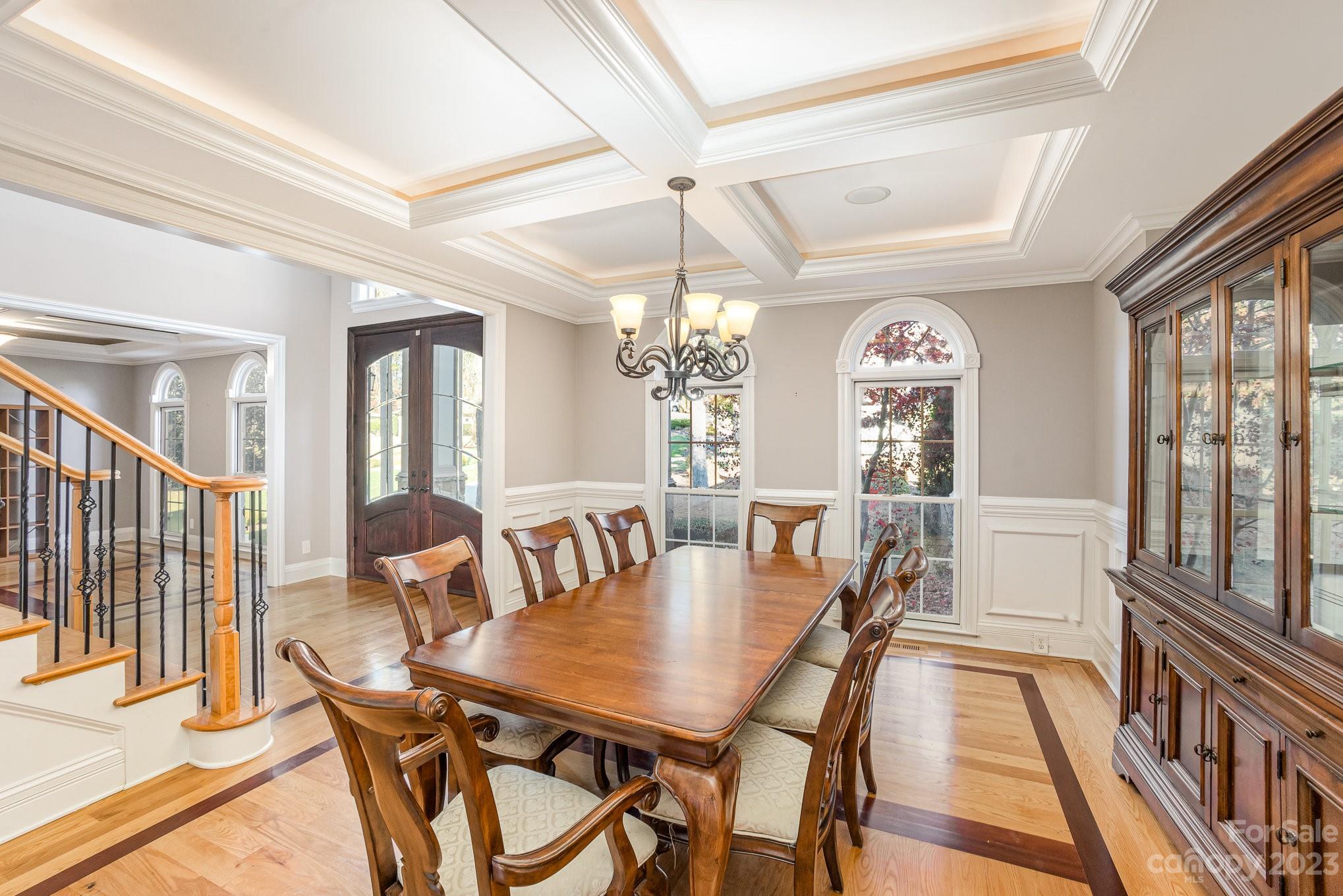142 Blue Ridge Trail Mooresville, NC 28117 - Photo 11 of 32 a view of a dining room with furniture window and wooden floor