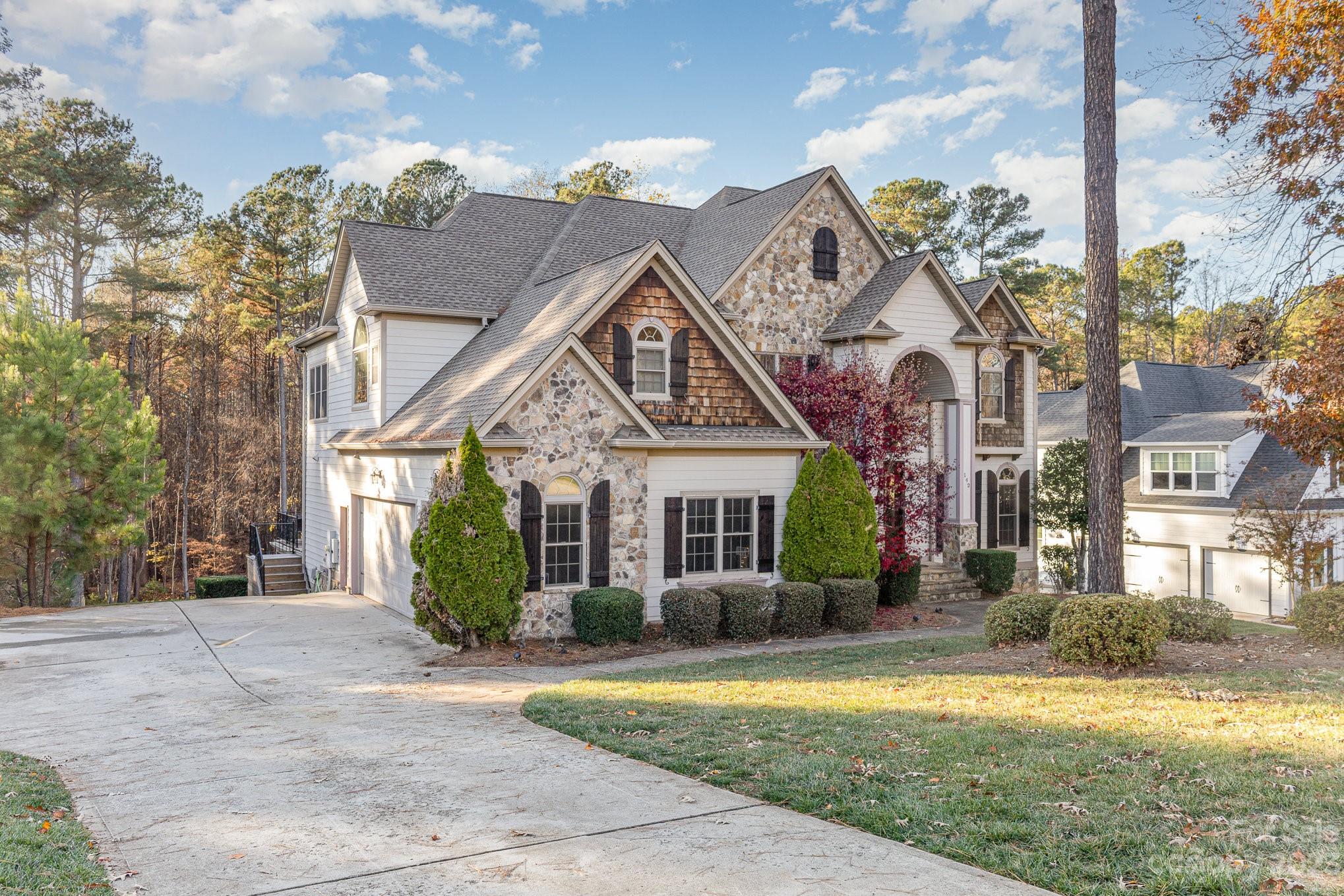 142 Blue Ridge Trail Mooresville, NC 28117 - Photo 2 of 32 front view of a house with a yard