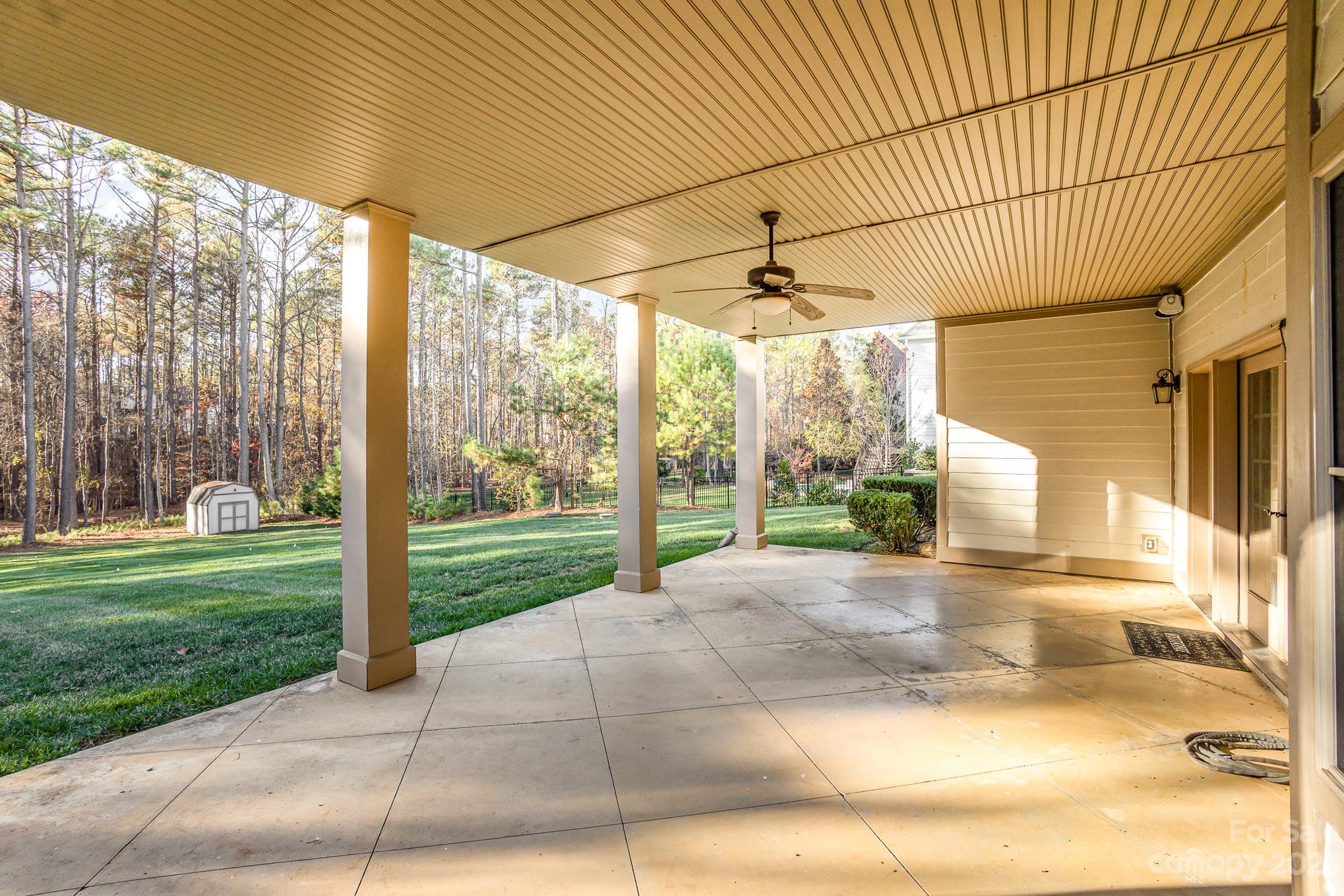 142 Blue Ridge Trail Mooresville, NC 28117 - Photo 30 of 32 a view of a porch with a garden