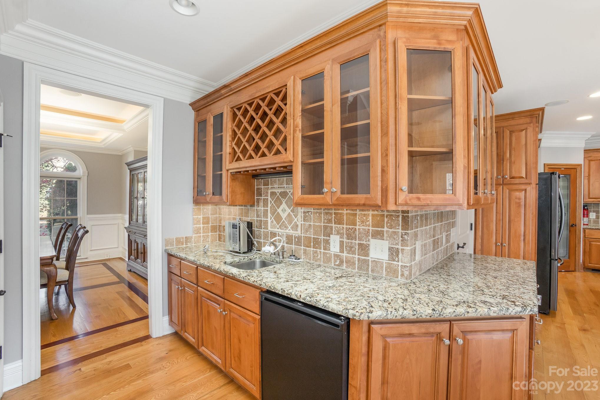 142 Blue Ridge Trail Mooresville, NC 28117 - Photo 10 of 32 a kitchen with granite countertop a sink and cabinets