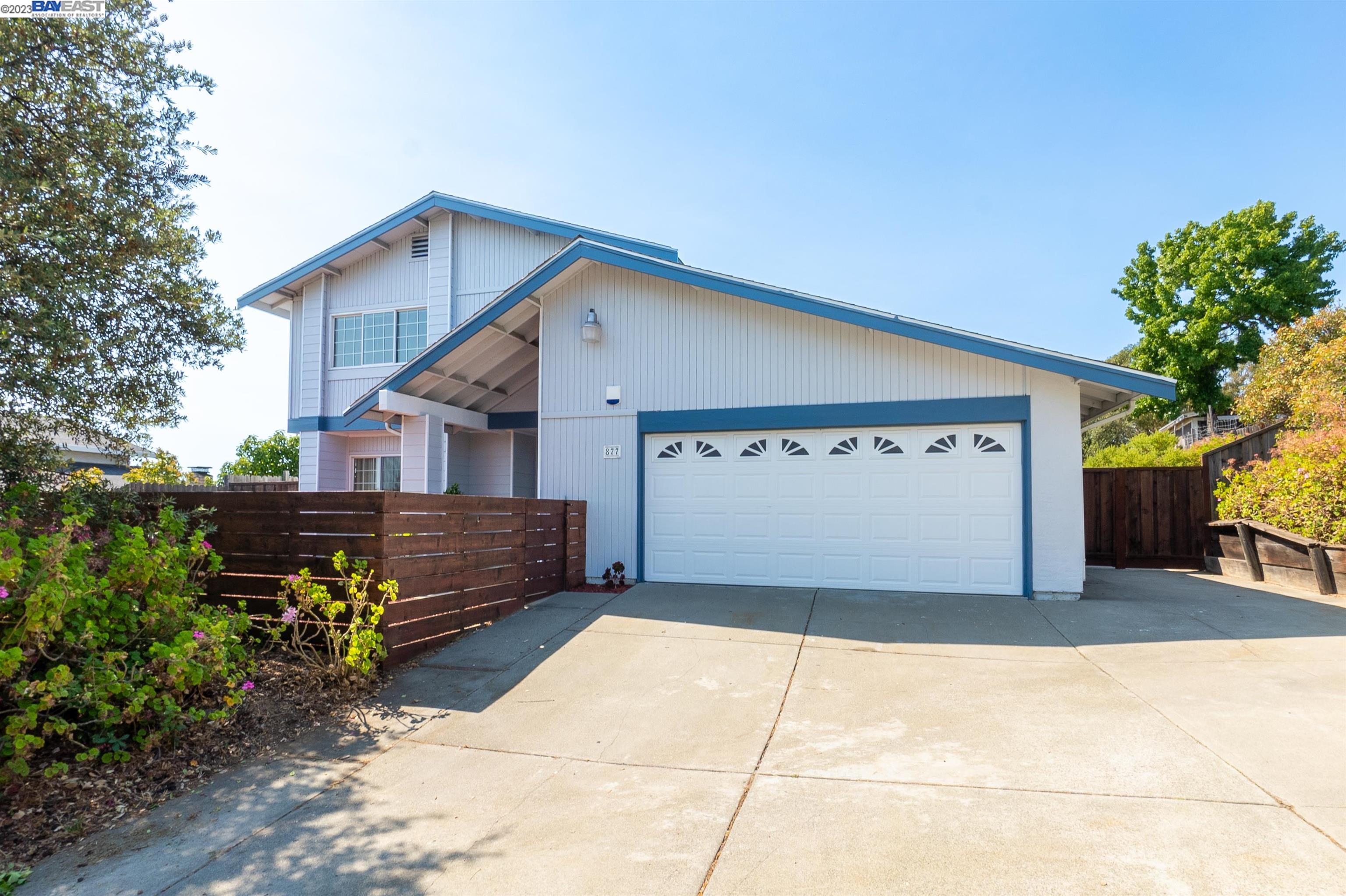 877 Sandy Cove Drive Rodeo, CA 94572 - Photo 1 of 1 a view of a house with a yard and potted plants