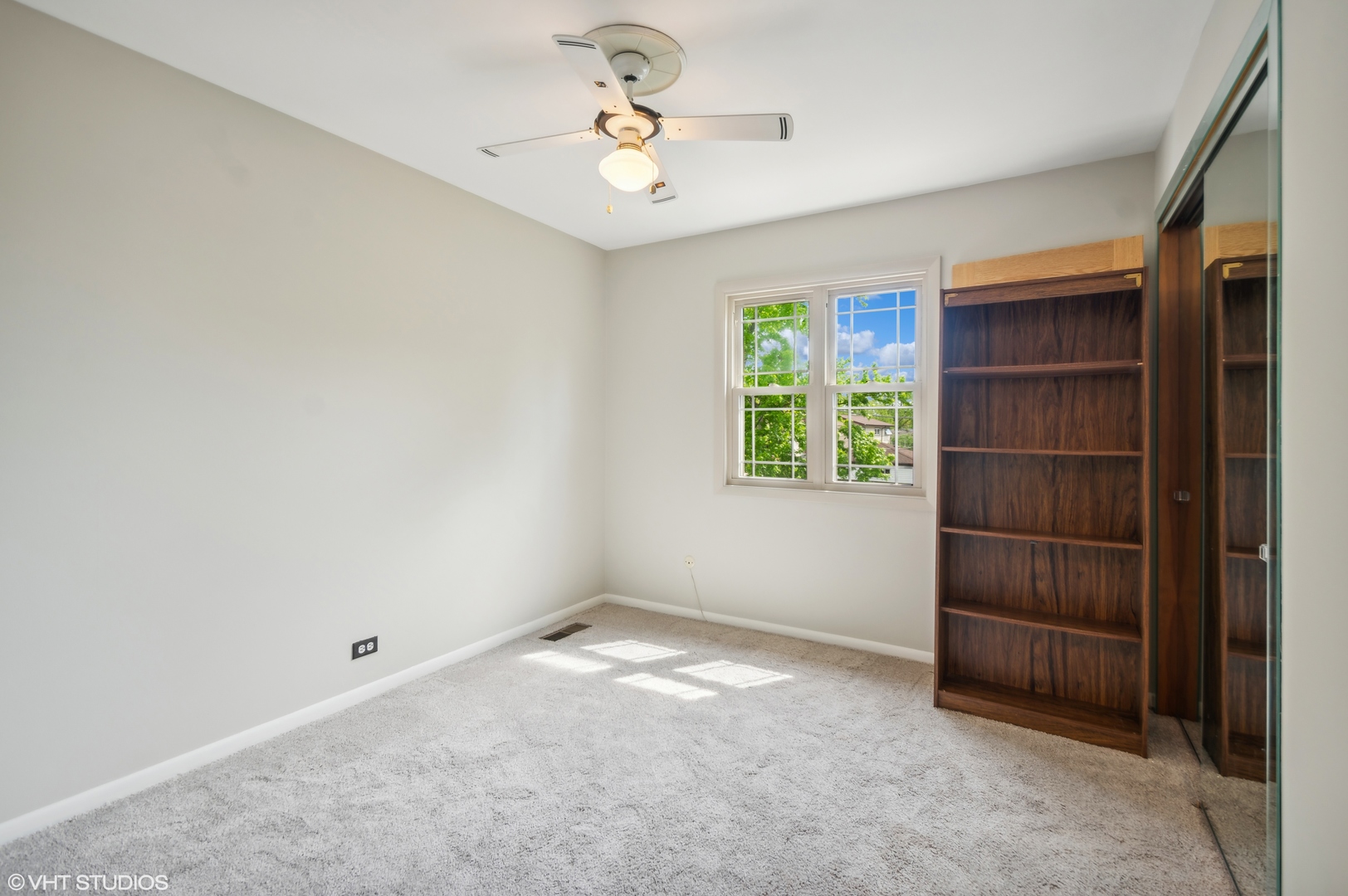 7962 Beckwith Road Morton Grove, IL 60053 - Photo 16 of 30 a view of an empty room with a window