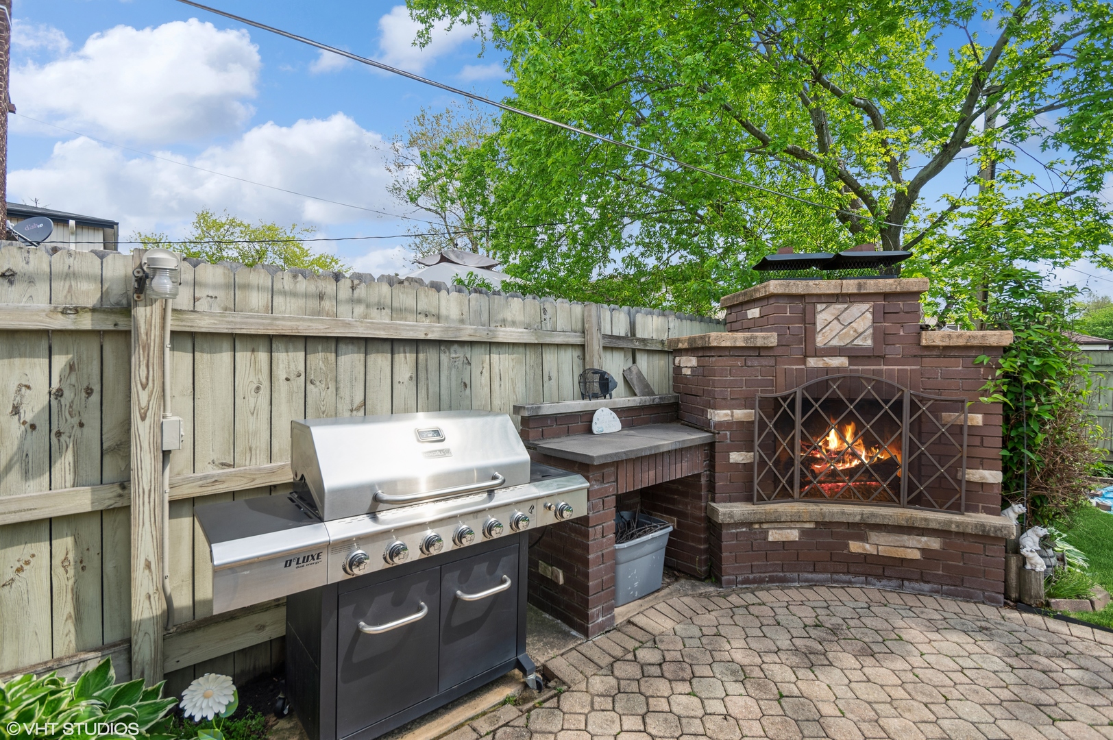 7962 Beckwith Road Morton Grove, IL 60053 - Photo 23 of 30 a view of a roof deck with wooden fence and a bench