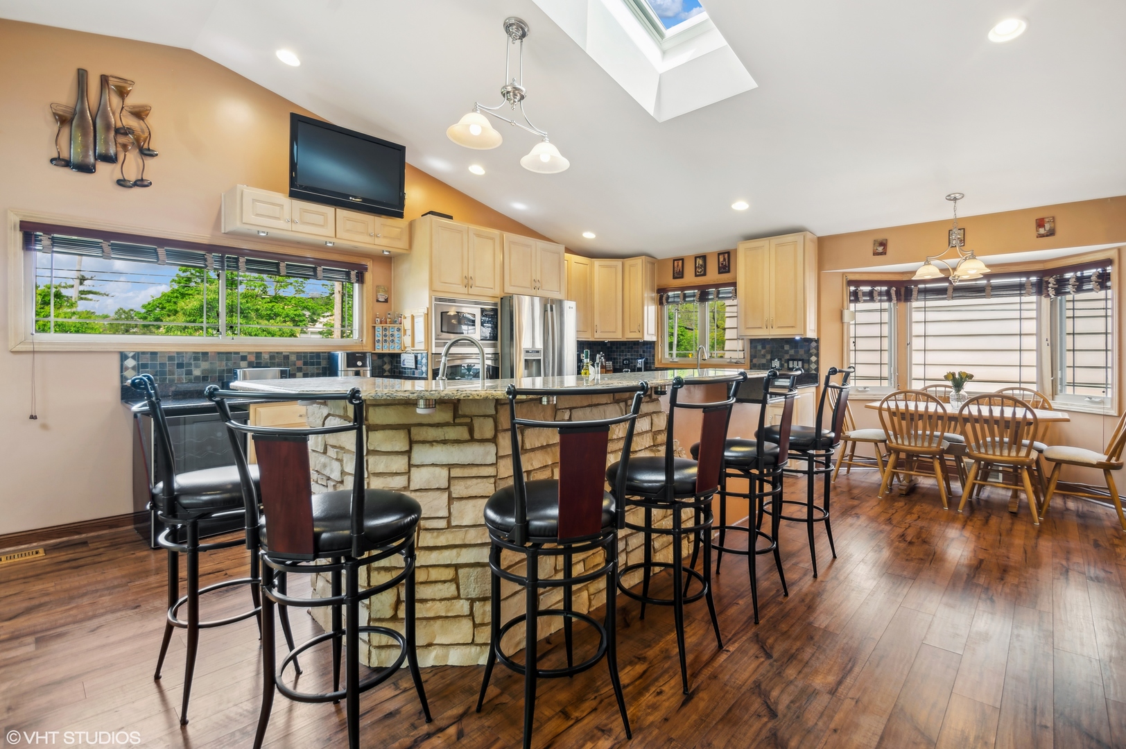 7962 Beckwith Road Morton Grove, IL 60053 - Photo 8 of 30 a view of a dining room with furniture window and wooden floor