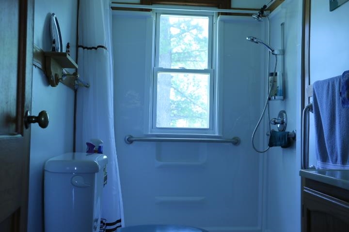 3354 Goeke Road Pecatonica, IL 61063 - Photo 4 of 7 a bathroom with a shower
