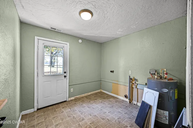a view of a room with toys and closet