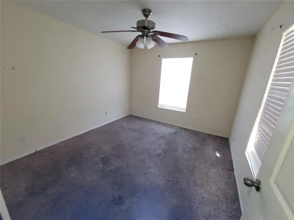 a view of a livingroom with a window