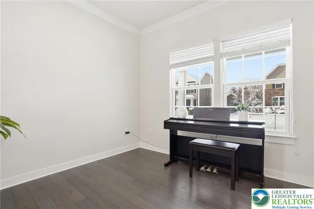 a bathroom with a sink a toilet a mirror a vanity and shower