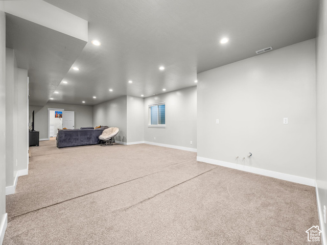 474 North 150th Street East Mapleton, UT 84664 - Photo 20 of 35 Spacious carpeted area with recessed lighting, a single window, and light-toned walls