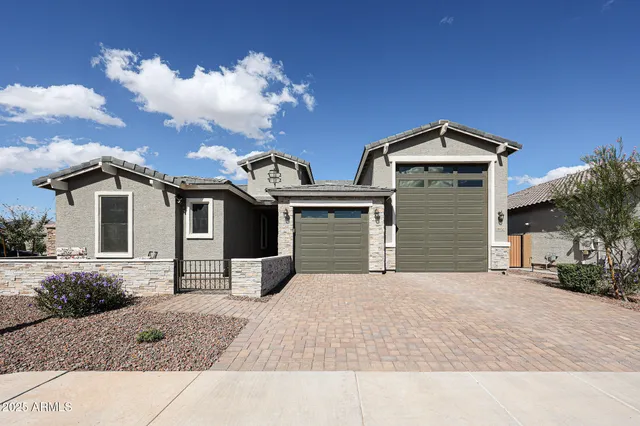 a front view of a house with yard