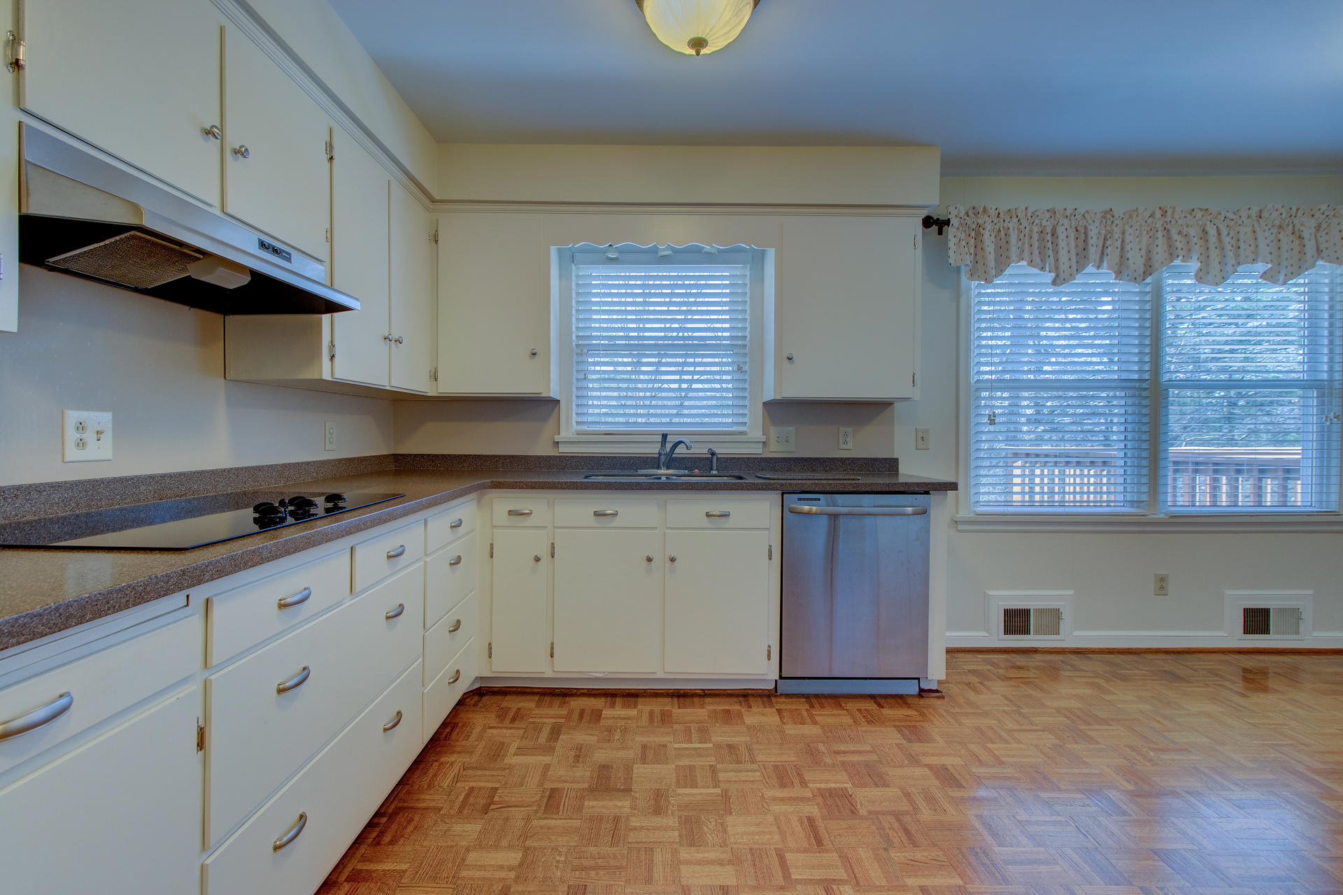 5123 Falcon Ridge Road Roanoke, VA 24018 - Photo 13 of 32 a kitchen with granite countertop a sink a stove and cabinets