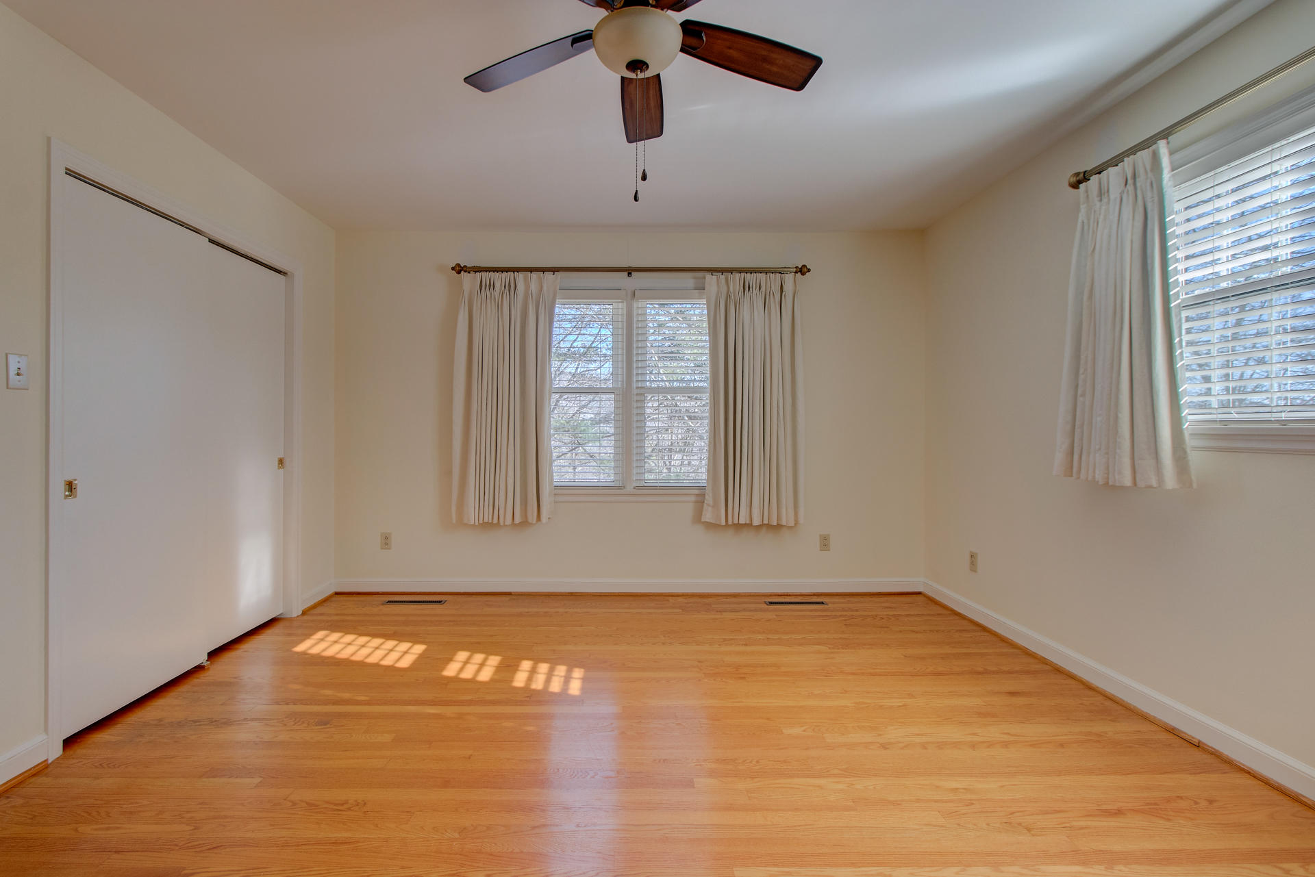 5123 Falcon Ridge Road Roanoke, VA 24018 - Photo 20 of 32 a view of empty room with wooden floor and fan