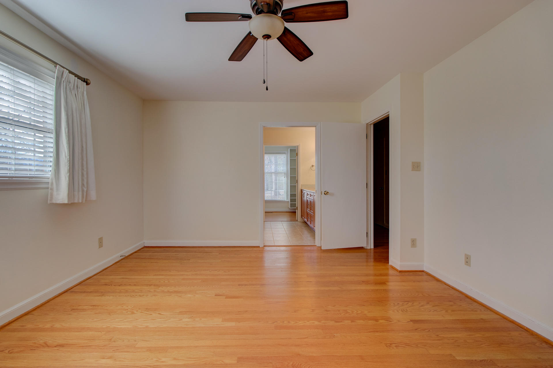 5123 Falcon Ridge Road Roanoke, VA 24018 - Photo 21 of 32 a view of empty room with wooden floor and window