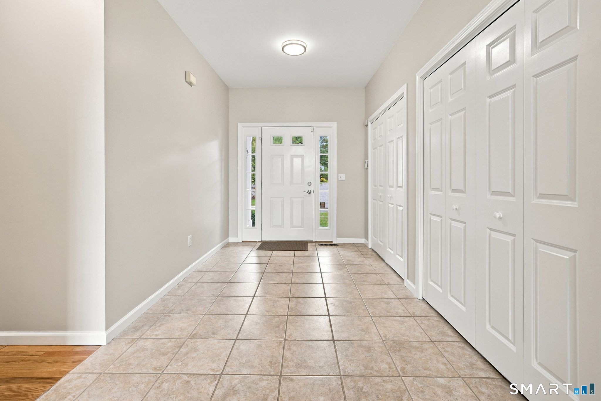 8 South Pond Road, Unit 8 Bloomfield, CT 06002 - Photo 2 of 40 Welcoming foyer greets you when you enter this beautifully updated home.