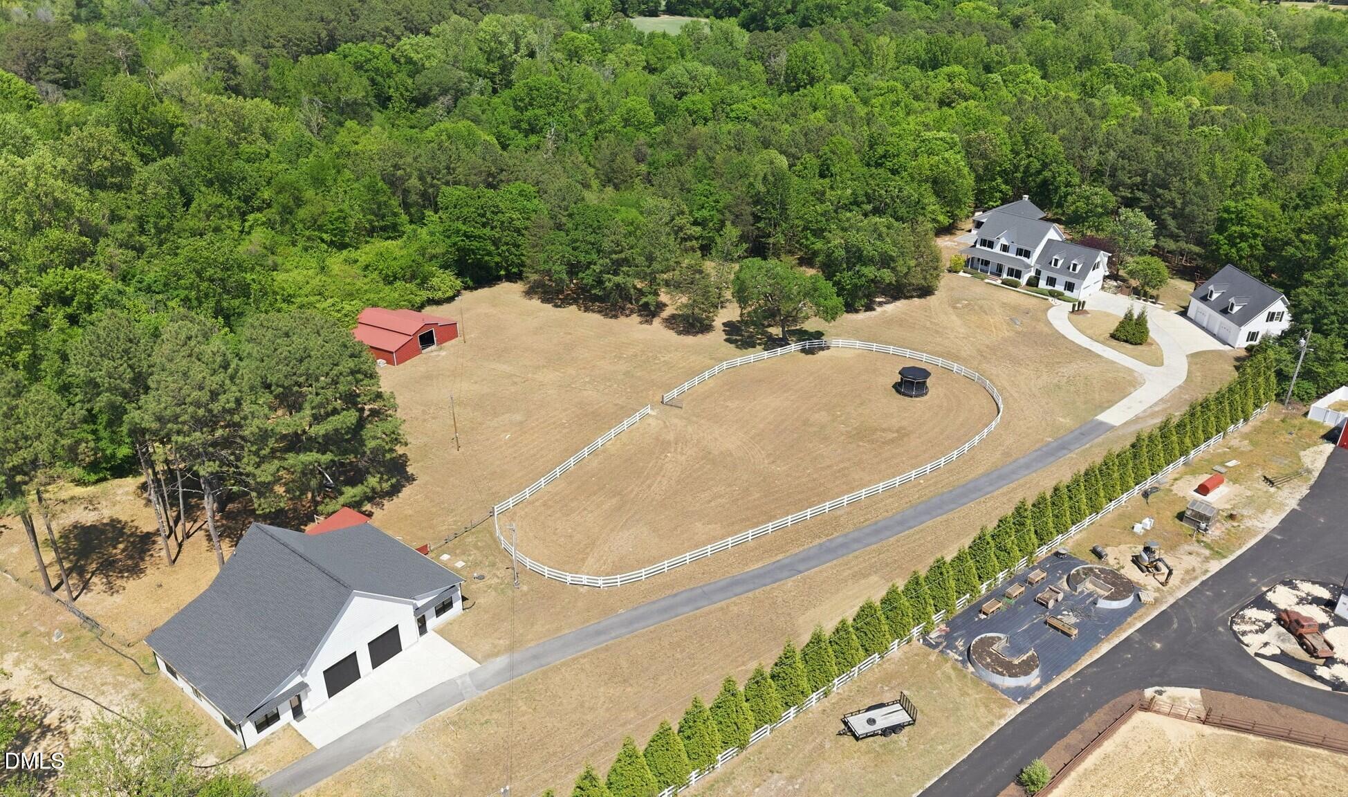 5416 Pulley Town Road Zebulon, NC 27597 - Photo 43 of 74 an aerial view of a house with a yard