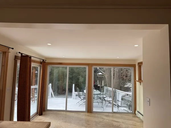a view of a room with a large window