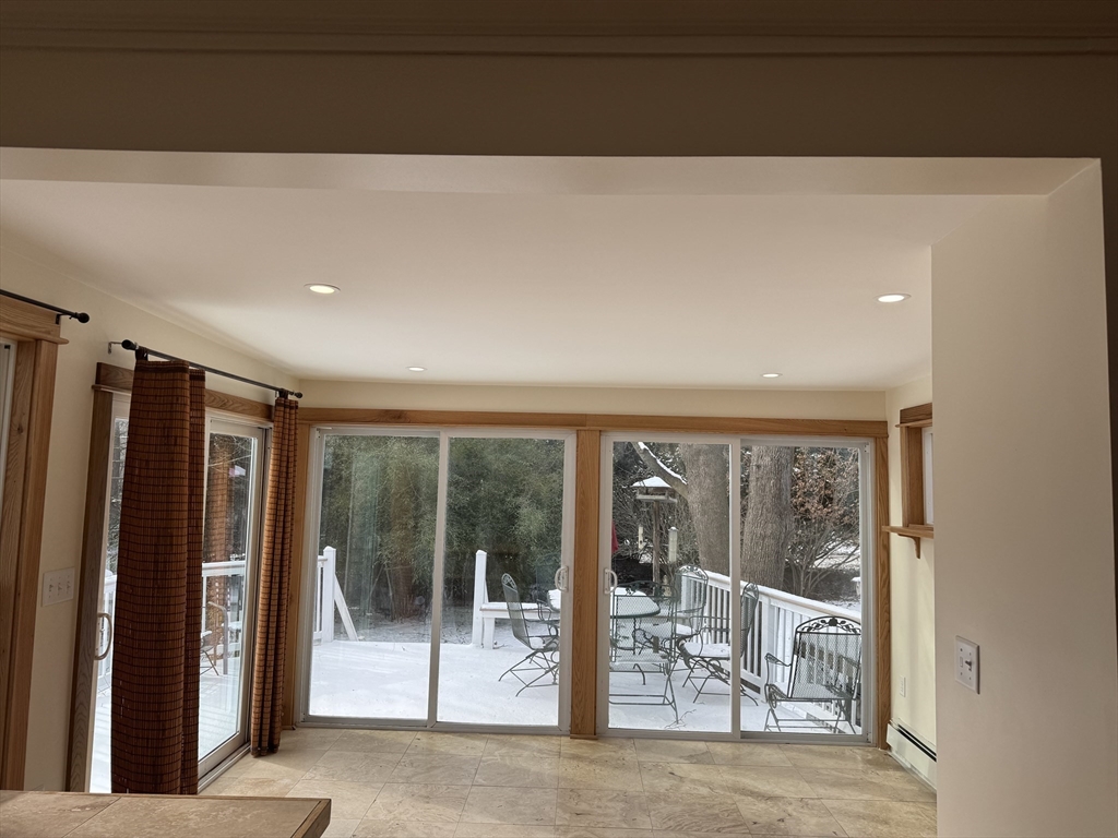 351 Village Street, Unit FIRST Millis, MA 02054 - Photo 8 of 9 a view of a room with a large window