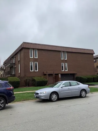 a car parked in front of a house