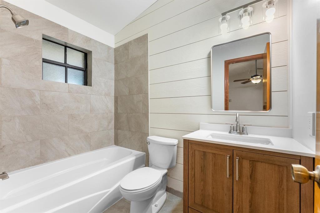 5051 Southwest 142nd Place Miami, FL 33175 - Photo 14 of 30 a bathroom with a sink toilet and tub