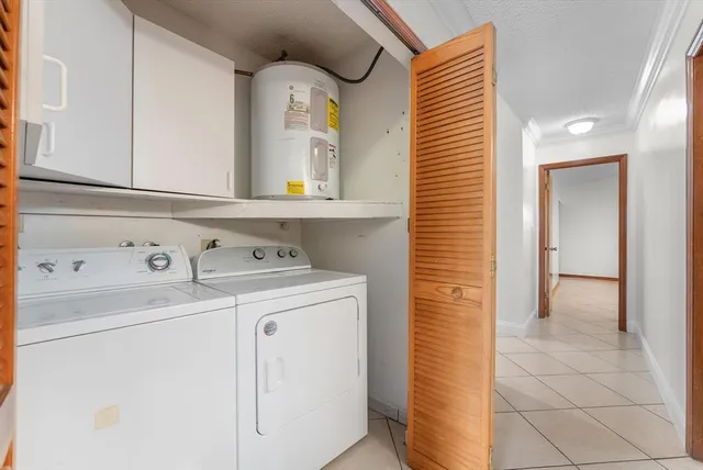 a view of an empty room with windows