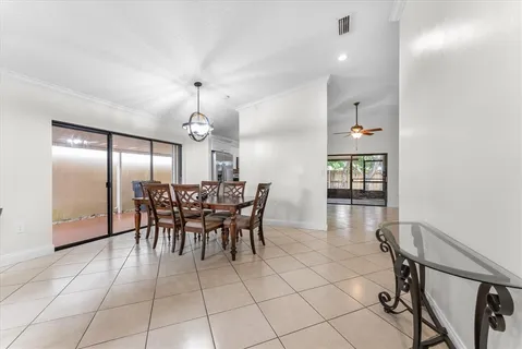 a kitchen with stainless steel appliances a refrigerator and microwave