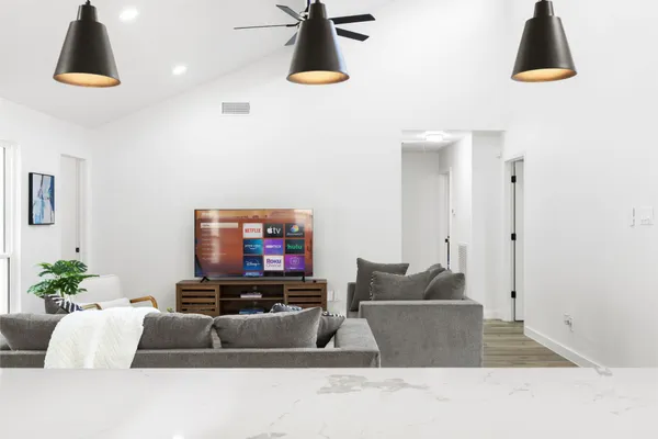 a living room with furniture and a window