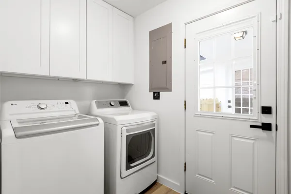 a utility room with dryer and washer