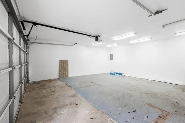 a view of a two chairs in the balcony