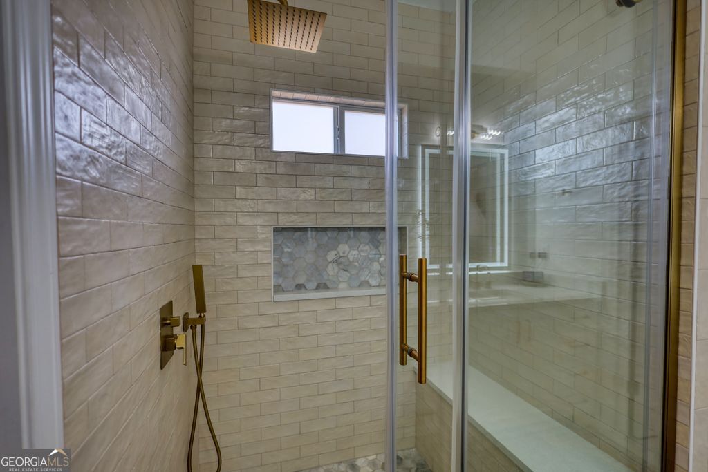 4610 Atlanta Highway Rutledge, GA 30663 - Photo 18 of 32 a bathroom with a shower