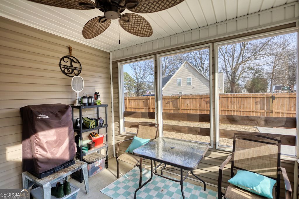4610 Atlanta Highway Rutledge, GA 30663 - Photo 29 of 32 a view of a dining room with furniture window and outside view
