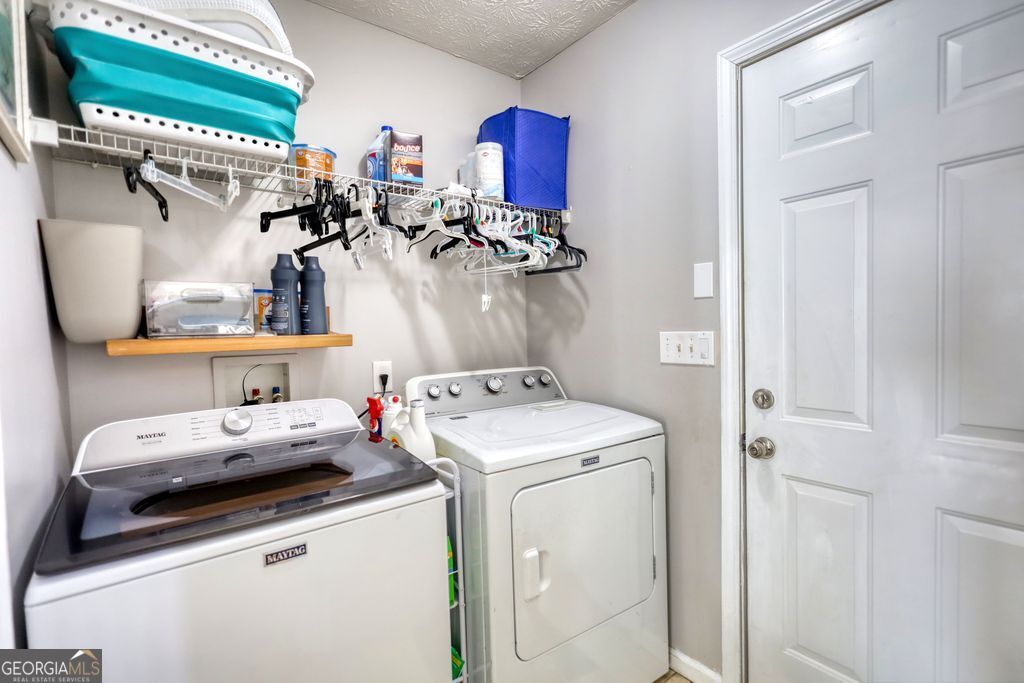 4610 Atlanta Highway Rutledge, GA 30663 - Photo 8 of 32 a utility room with dryer and washer
