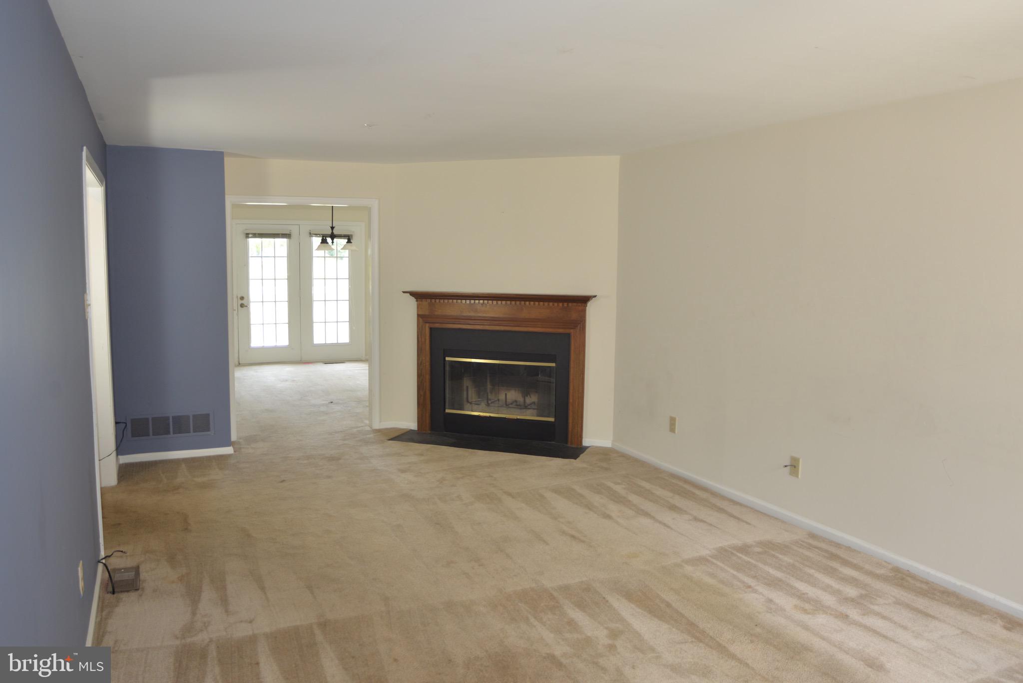 323 Shetland Drive Exton, PA 19341 - Photo 5 of 22 Living room with fireplace