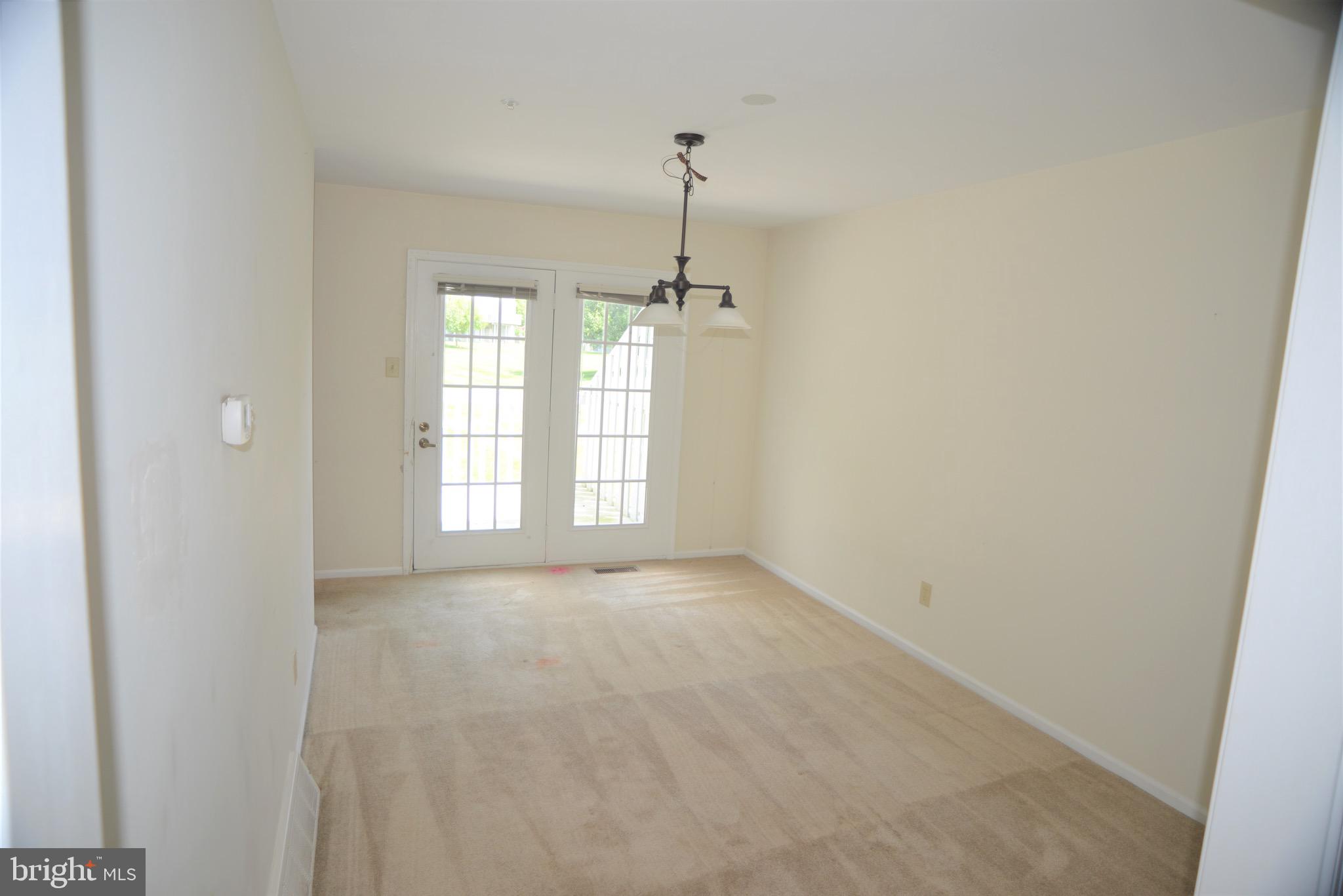 323 Shetland Drive Exton, PA 19341 - Photo 7 of 22 Dining room with atrium door to deck