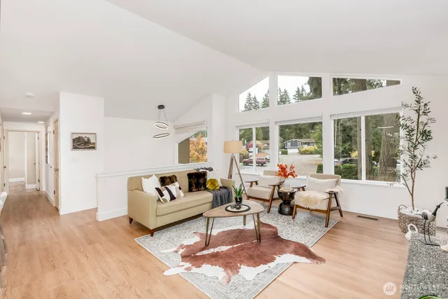 a bed room with a bed and a window