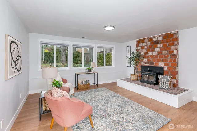 a backyard of a house with trees and plants