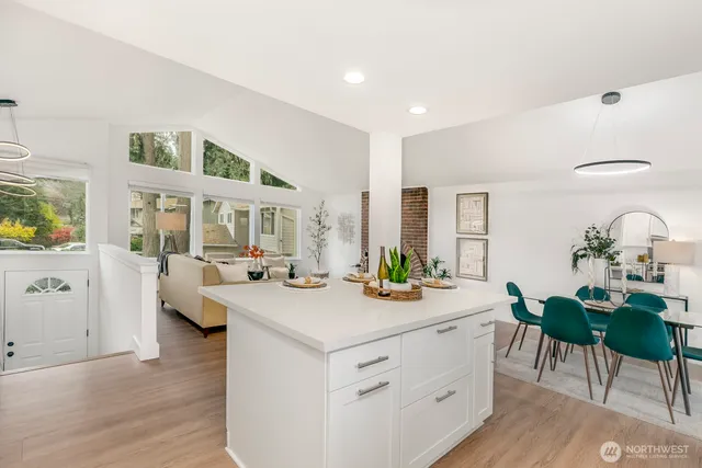a view of a dining room with furniture window and outside view