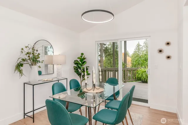 a view of a balcony with wooden floor