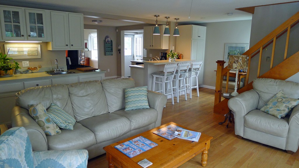 40 Wayside Street Springfield, MA 01118 - Photo 16 of 30 a living room with furniture and a chandelier