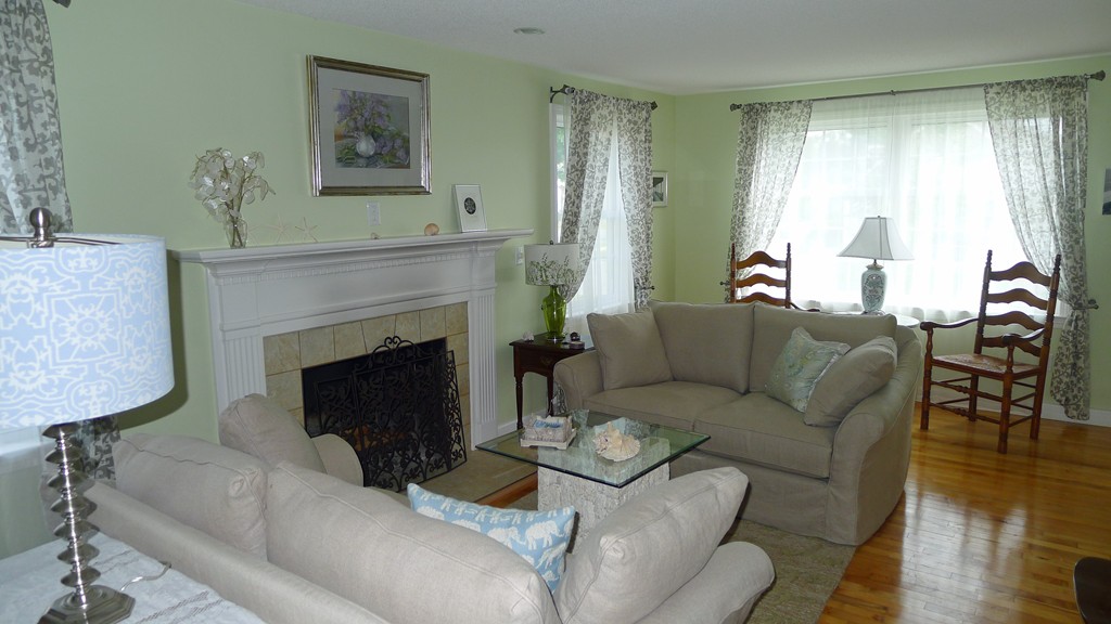 40 Wayside Street Springfield, MA 01118 - Photo 2 of 30 a living room with furniture and a fireplace