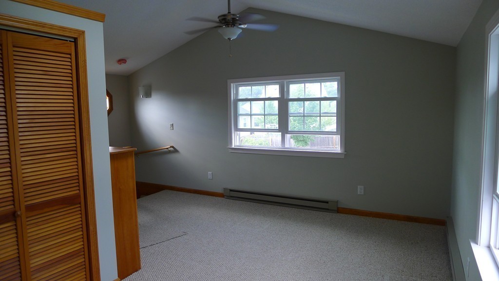40 Wayside Street Springfield, MA 01118 - Photo 25 of 30 a view of an empty room with a window