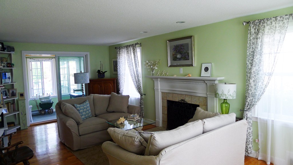 40 Wayside Street Springfield, MA 01118 - Photo 3 of 30 a living room with furniture and a fireplace