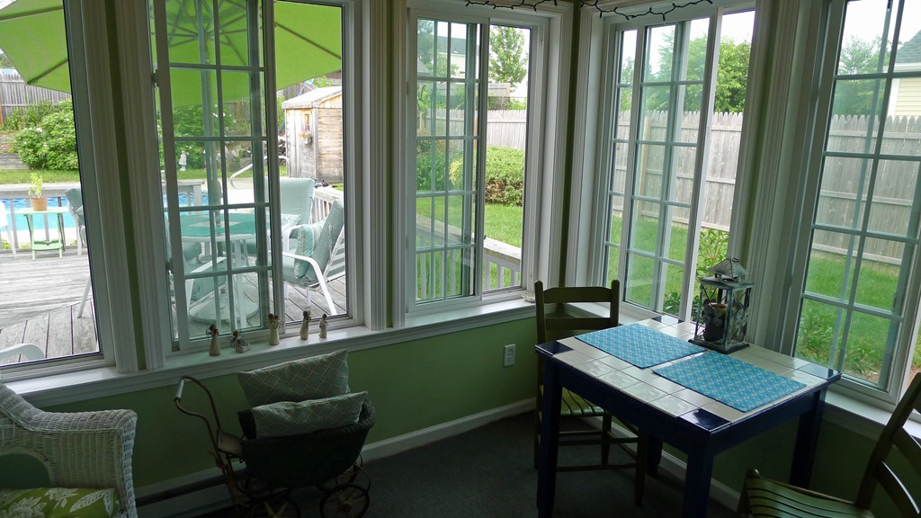 40 Wayside Street Springfield, MA 01118 - Photo 5 of 30 a view of a dining room with furniture window and outside view