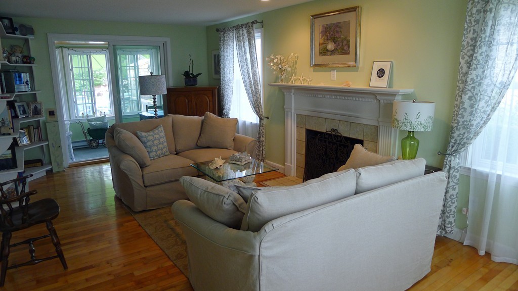 40 Wayside Street Springfield, MA 01118 - Photo 7 of 30 a living room with furniture and a fireplace