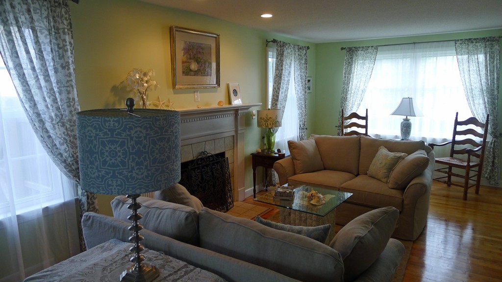 40 Wayside Street Springfield, MA 01118 - Photo 8 of 30 a living room with furniture and a fireplace