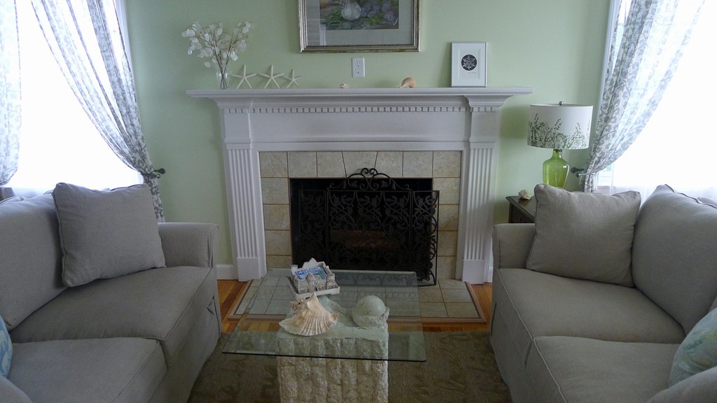 40 Wayside Street Springfield, MA 01118 - Photo 10 of 30 a living room with furniture and a fireplace