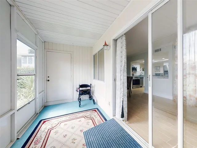 a bed room with a bed and a window